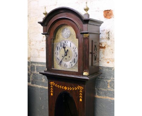 An early 20th Century inlaid mahogany long case clock with chiming movement, the silvered brass dial labelled 'Tempus sugit'.