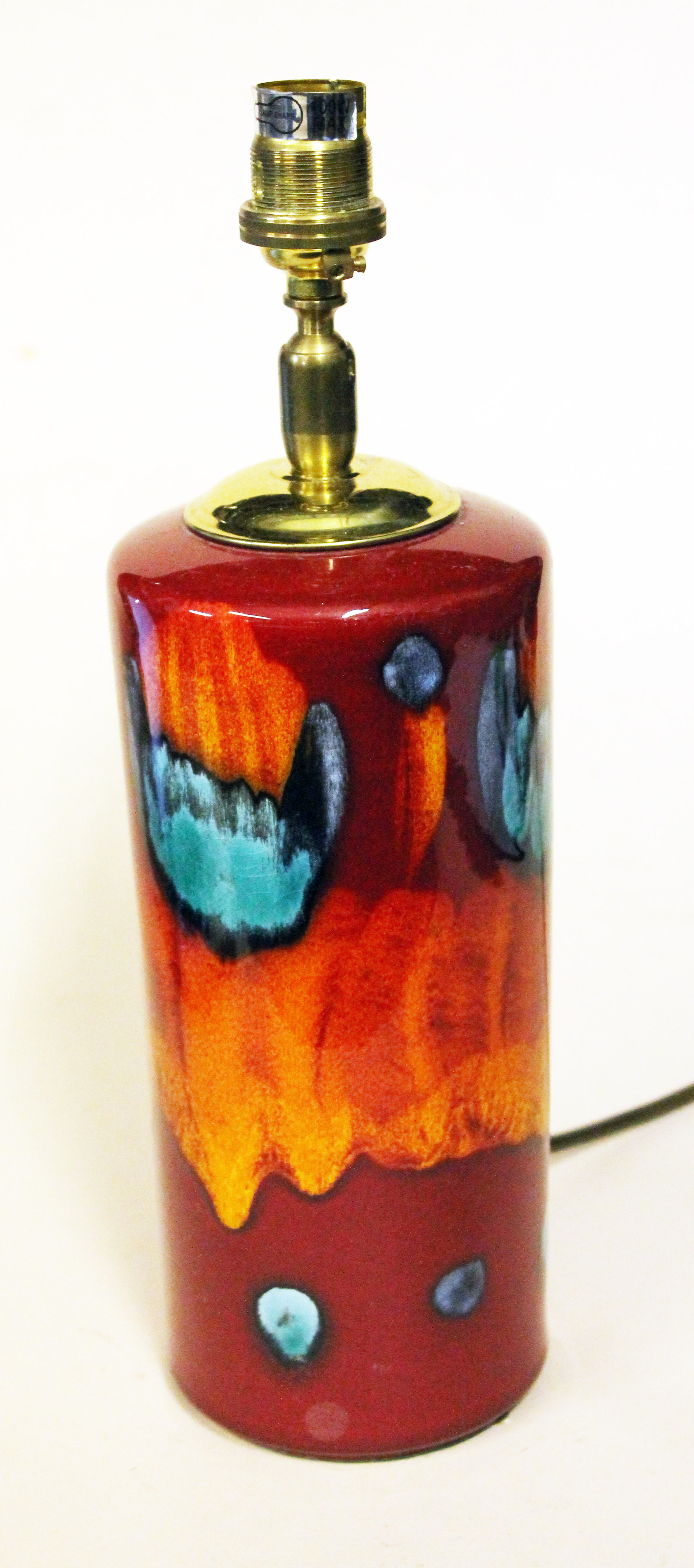 A Poole pottery lamp base. H31cm. Condition good, no damage, crazing