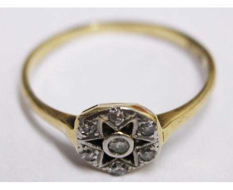 An 18ct gold and diamond Art Deco style ring. Wt. 1.7g Size K