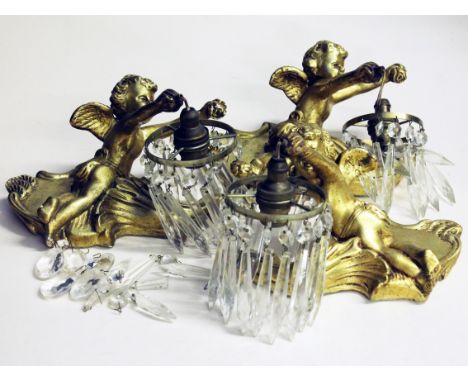 A group of three gilt cherub drop lustre light fittings. Condition - general wear to cherubs to include minor chips, scratche