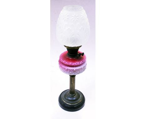 A Victorian oil lamp with pressed glass shade. H67cm. Condition - no flue, shade appears damage free, wear to gilding decorat