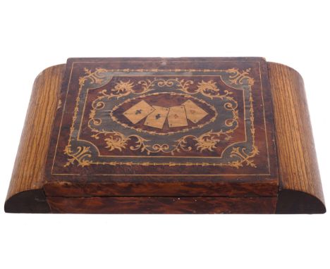 EDWARDIAN PERIOD WALNUT AND MARQUETRY GAMES BOXthe top inlaid with playing cards and dragon heads5 cm. high; 28 cm. wide; 16 