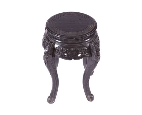 NINETEENTH-CENTURY CHINESE PROFUSELY CARVED STANDthe circular key scrolled carved top above a conforming frieze and profusely