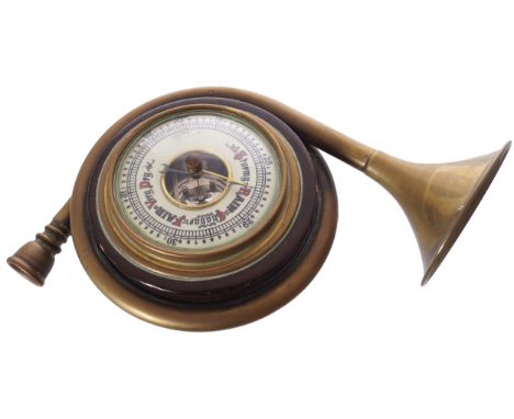 ANEROID BAROMETER enclosed in a brass hunting horn11 x 20 cm.