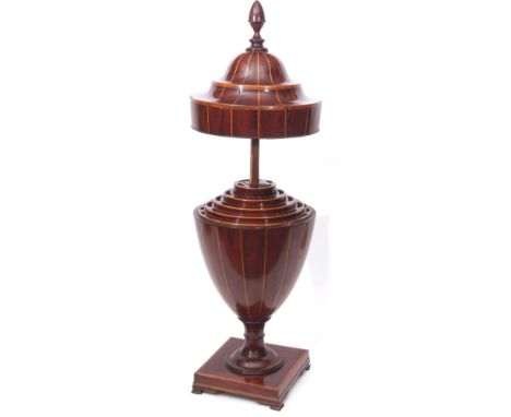 Late 18th/early 19th century mahogany urn shaped knife box, of circular form, the domed top applied with a plain acorn finial