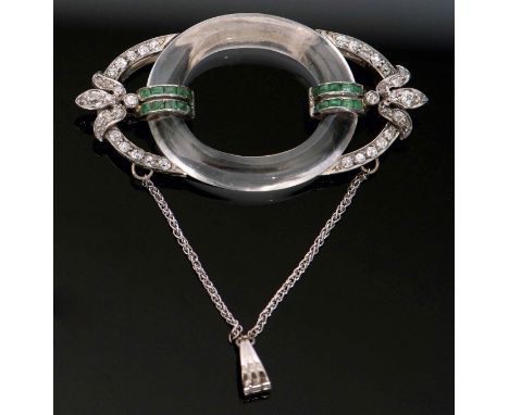 Art Deco rock crystal emerald and diamond brooch, circa 1925, the oval shaped open work brooch, with a central panel of rock 