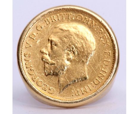 George V half sovereign, dated 1914, framed in an 18c stamped ring mount, 9.6gms gross weight, size K/L