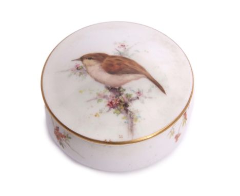 Royal Worcester circular box and cover, the cover finely decorated with a bird on a floral branch, the circular box with flor