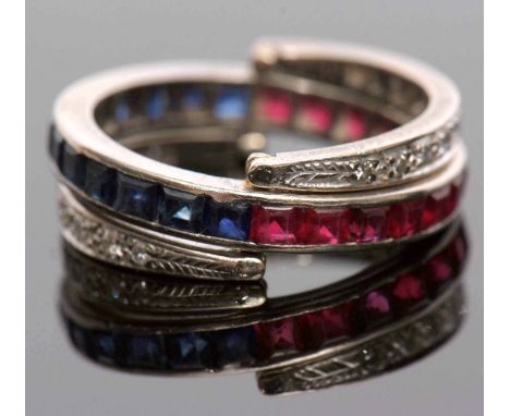 Art Deco diamond, sapphire and ruby "Day and Night" ring featuring a full eternity band set with 13 rubies and 13 sapphires, 