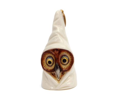 Early 20th century Royal Worcester candle snuffer modelled as an owl with brown face and blue/yellow eyes and beak, cloaked i