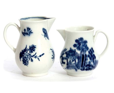 Two Worcester sparrowbeak jugs, one with the three flowers pattern, the other with the man on the fence pattern, largest jug 