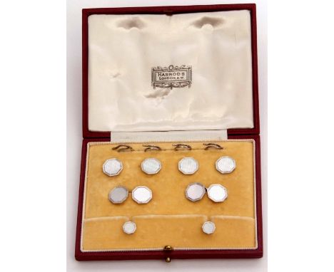 Art Deco 9ct white gold dress set with mother of pearl plaques with incised decoration, the white gold borders with engine tu