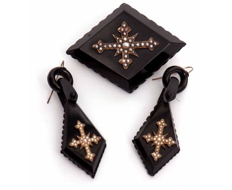 Victorian carved jet mourning brooch and matching earrings circa 1875, each applied with a seed pearl set cruciform centre, t