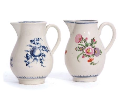 Two Worcester porcelain sparrowbeaks, one with blue and white decoration of fruit with crescent mark to base, the other with 