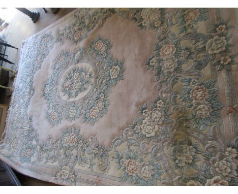 Late 20th century Indian or Chinese thick pile wool carpet typically decorated with stylised foliage on a faded puce field, 3