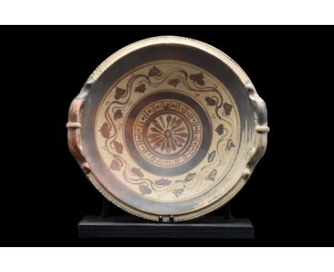 Subgeometric III, Ca. 4th century BC. With a rosette in the tondo enclosed within a band of alternating lines and dots, frame