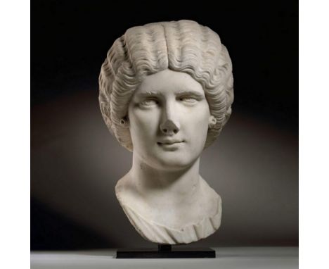 Ca. Early 3rd century AD. An over life-sized portrait, gracefully sculpted, the Empress portrayed as a mature woman, her oval