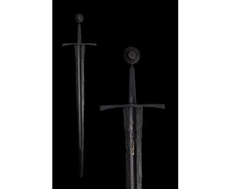 Ca. 1350 AD. This late Medieval sword comprises of a long slender triangular blade with a fuller, three quarters of its lengt