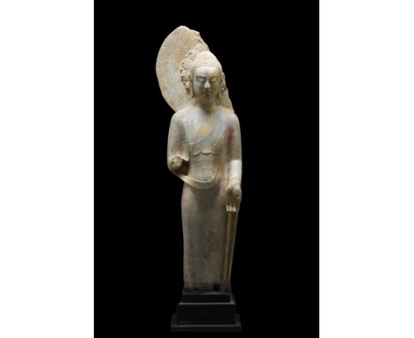 Northern Qi Dynasty, Ca. 550-577 AD (or later). The slender, elegant figure is depicted in a standing pose, originally on top