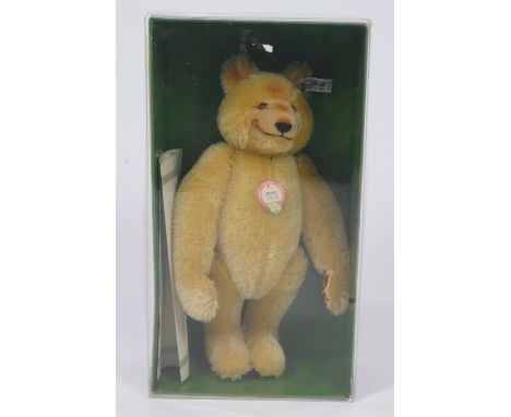 A Steiff 1985 limited edition teddy bear 'Dicky 1930 Replica', No 8625 of 20,000, fully jointed, with glass eyes, metal butto