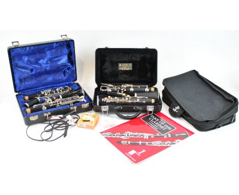 A cased John Packer 121 clarinet, 63cm long, and another by Bundy