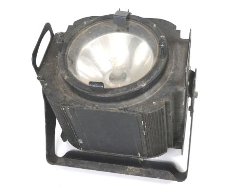 A large vintage theatre stage light, with mounting bracket and filter clips, 44cm high x 48.6cm wide