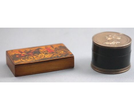A composition two piece round form snuff box set to the top and base with panels commemorating Charles Fox, 3.5cm high x 5cm 