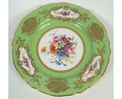 A Royal Worcester Sevres style cabinet plate with a central polychrome floral panel of roses, a passion and other flowers, si