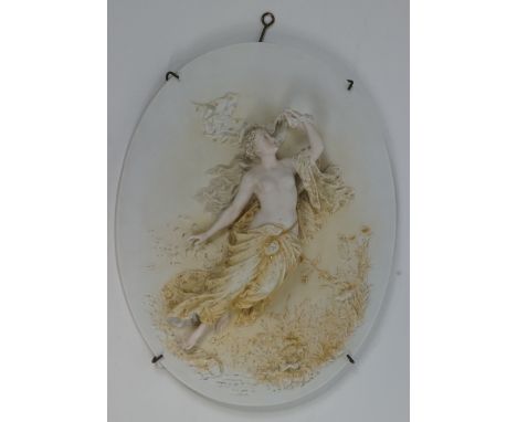 A 19th century Continental bisque porcelain oval wall panel of a nymph, 35cm high