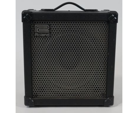 A Roland Cube 60 COSM amplifier, 43cm high