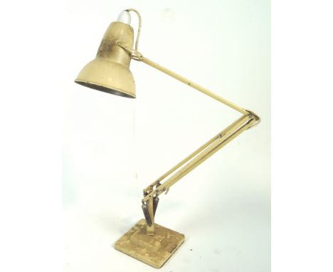 A Herbert Terry Anderson anglepoise lamp, finished in cream and set on a stepped base, 89cm high
