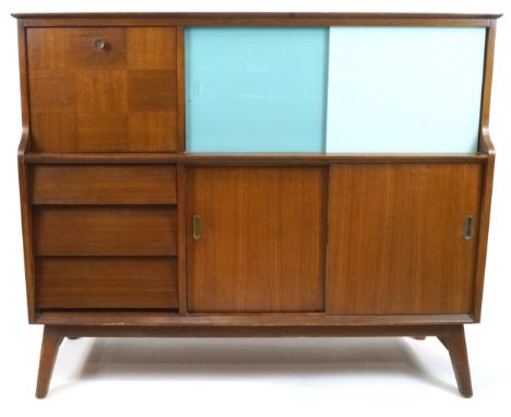 A teak 1960's side cabinet, the top section with glazed sliding cupboard doors and a fall front door enclosing a cupboard, th