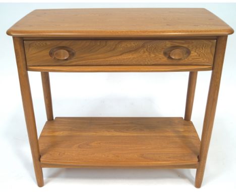 An Ercol elm wood rectangular side table (model No 1187) with shaped rectangular top with single drawer and base shelf, 72cm 