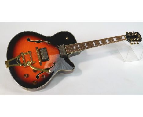 A Stagg electric guitar, overall 105cm long x 40cm wide