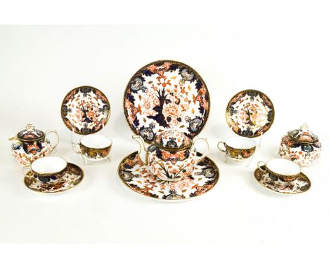 A Royal Crown Derby Imari pattern composite part tea service, circa 1900, printed and impressed marks, comprising : two circu