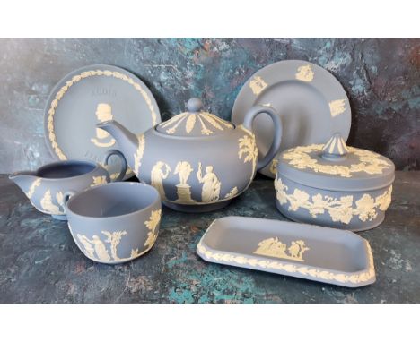 A Wedgwood Jasperware blue and white teapot and cover;&nbsp; &nbsp;a similar milk jug, trinket pot and cover;&nbsp; etc 