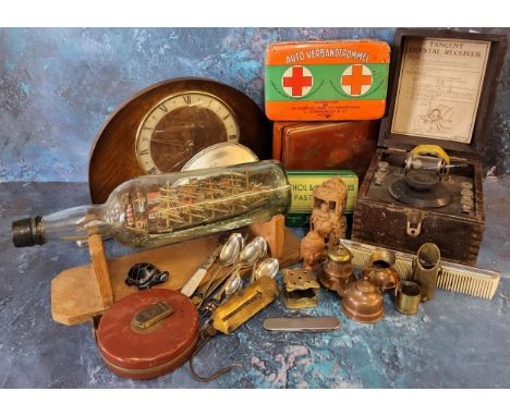 A Tangent Crystal Receiver, boxed;&nbsp; a walnut mantel clock, c.1950;&nbsp; ship in a bottle;&nbsp; mid 20th century tins;&