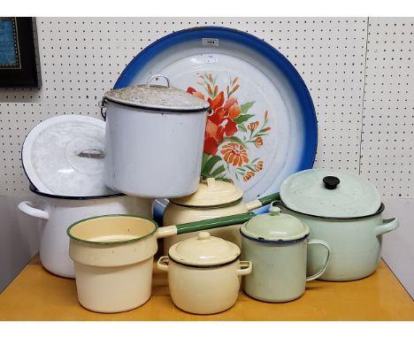 Metalware - various enamel canisters, sauce pans and a large charger painted with flowers 