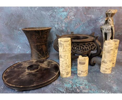 Tribal Art -&nbsp; a treen waisted cylindrical pestle;&nbsp; bone dagger hafts;&nbsp; a Chinese hardwood stand;&nbsp; etc 