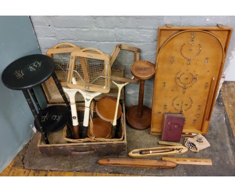 A Chad Valley Bagatelle board;&nbsp; a Caravelle tennis racket; another, Dunlop;&nbsp; an early 20th century suitcase;&nbsp; 