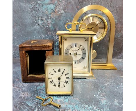 A silverplated brass travel clock, french movement, white enamel dial black Roman numerals, Williams &amp; Co 41 &amp; 74 New