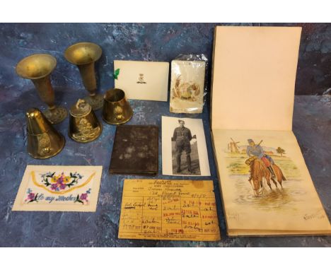 An early 20th century Bon Mon commonplace book, Militaria trench art lighter with Royal Artillery insignia, other matchstick 