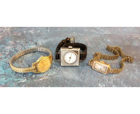 A 9ct gold lady's wristwatch, Swiss 15 jewel movement, rectangulr silvered dial, Arabic numerals, gold plated bracelet n/w; a