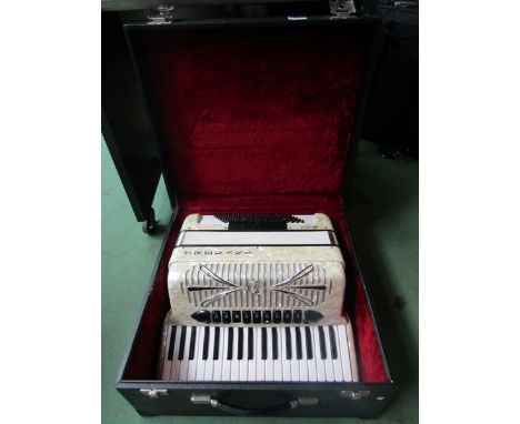 A Trevani Artist 96 bass piano accordion with pearlescent case, fitted hard case