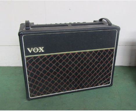 A vintage Vox Climax 125 electric guitar valve amplifier with additional replacement valves