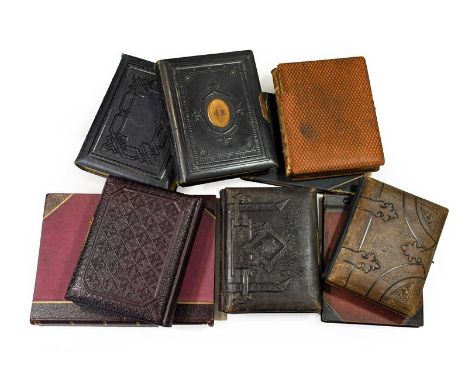 Cartes de visite. An album of about 80 cartes de visite, c.1870. 4to album (305 x 230 mm), contemporary embossed black padded