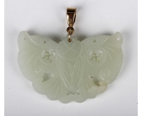 A Chinese pale celadon jade pendant, probably 20th century, carved and pierced in the form of a butterfly, length 5.2cm, fitt