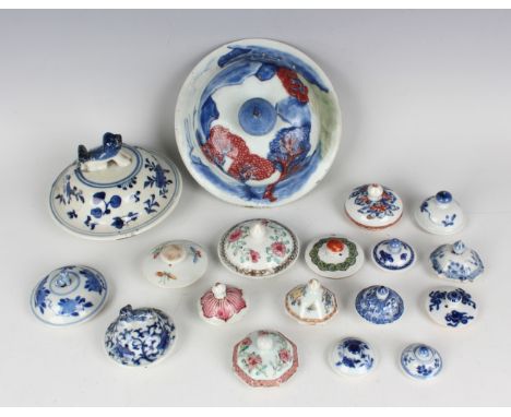 A collection of Chinese porcelain covers/lids, mostly Kangxi and Yongzheng period, including an underglaze blue, red and cela