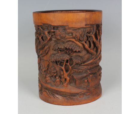 A Chinese carved bamboo brush pot, early 20th century, decorated with a continuous figural scene and incised with five lines 