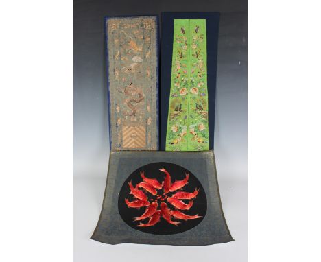 A Chinese silk embroidered rectangular panel, late Qing dynasty, worked in gilt metallic threads with fenghuang, Buddhistic l